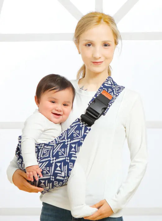 Shoulder baby strap, infant holder, woman holding baby with baby shoulder strap.