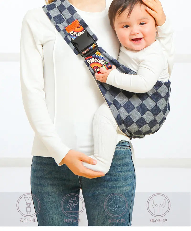 Shoulder baby strap, infant holder, woman holding baby with baby shoulder strap checkered design. 